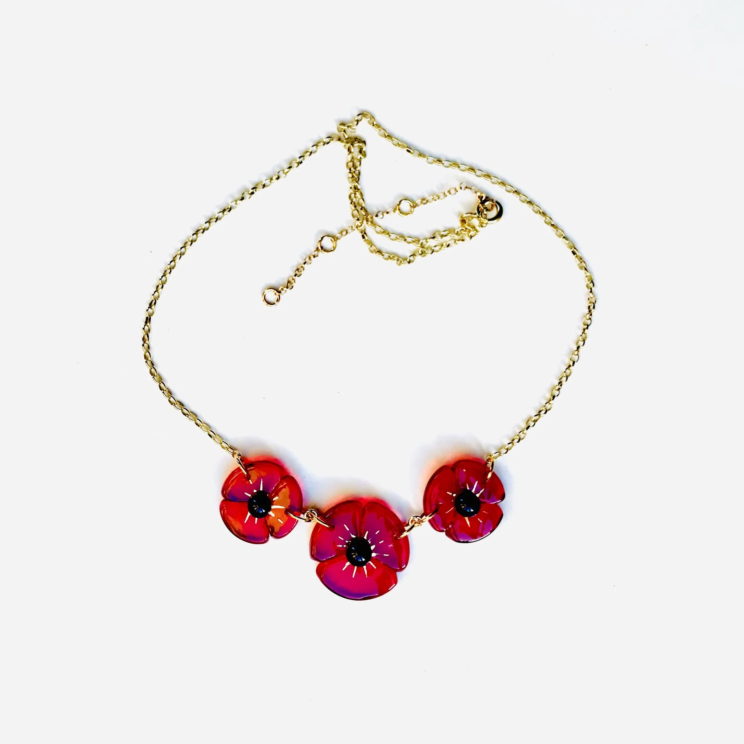 Collier 3 fleurs rouge vif ED96B11E-8275-46E3-8CA6-4DB3CBAFF7EC_1_201_a.jpg