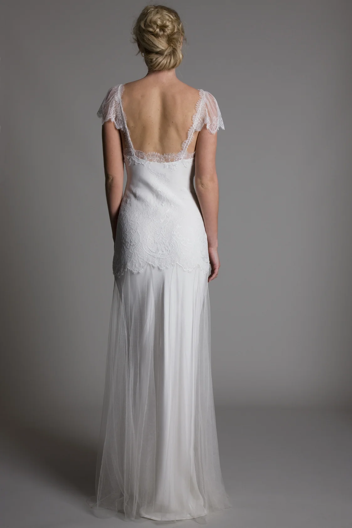 Back view of the Kate chantilly lace bodice and cap sleeves with tulle skirt and satin scoop neck slip bridal wedding dress by Halfpenny London