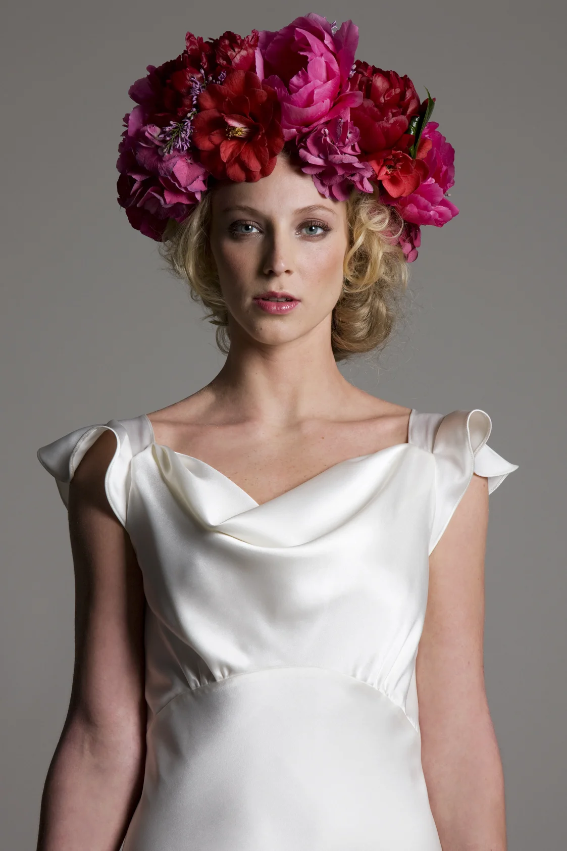 Detailed view of the Sarah soft cowl neck and empire line bias cut satin bridal wedding dress by Halfpenny London