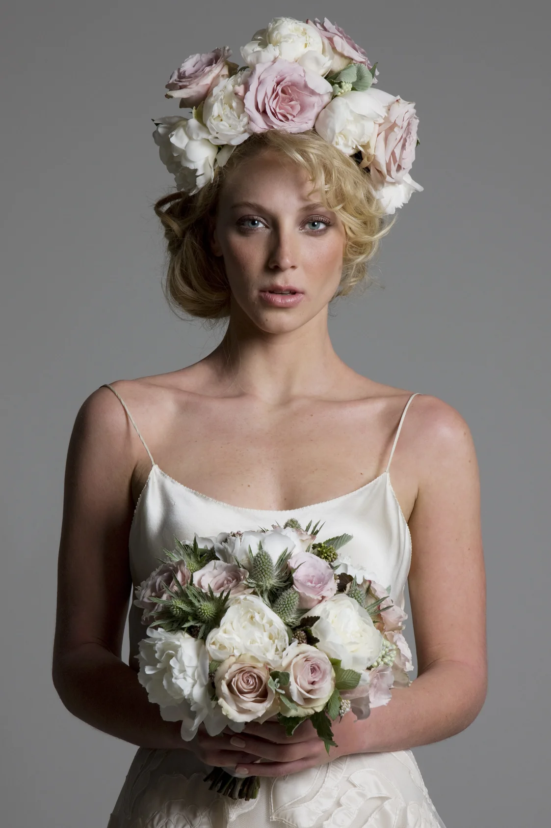 Close up of the Susie hand appliques tulle skirt with Iris backless bias cut slip wedding dress by Halfpenny London