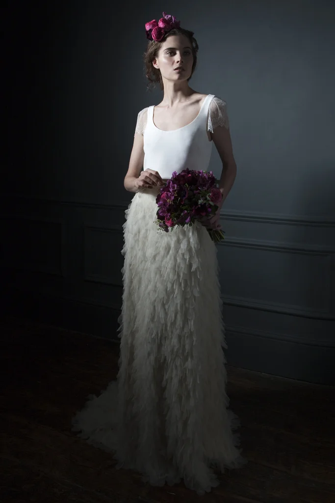 Front View of the Swan silk tulle skirt with buddle train, paired with a silk crepe tee with chantilly lace sleeves bridal wedding dress by Halfpenny London