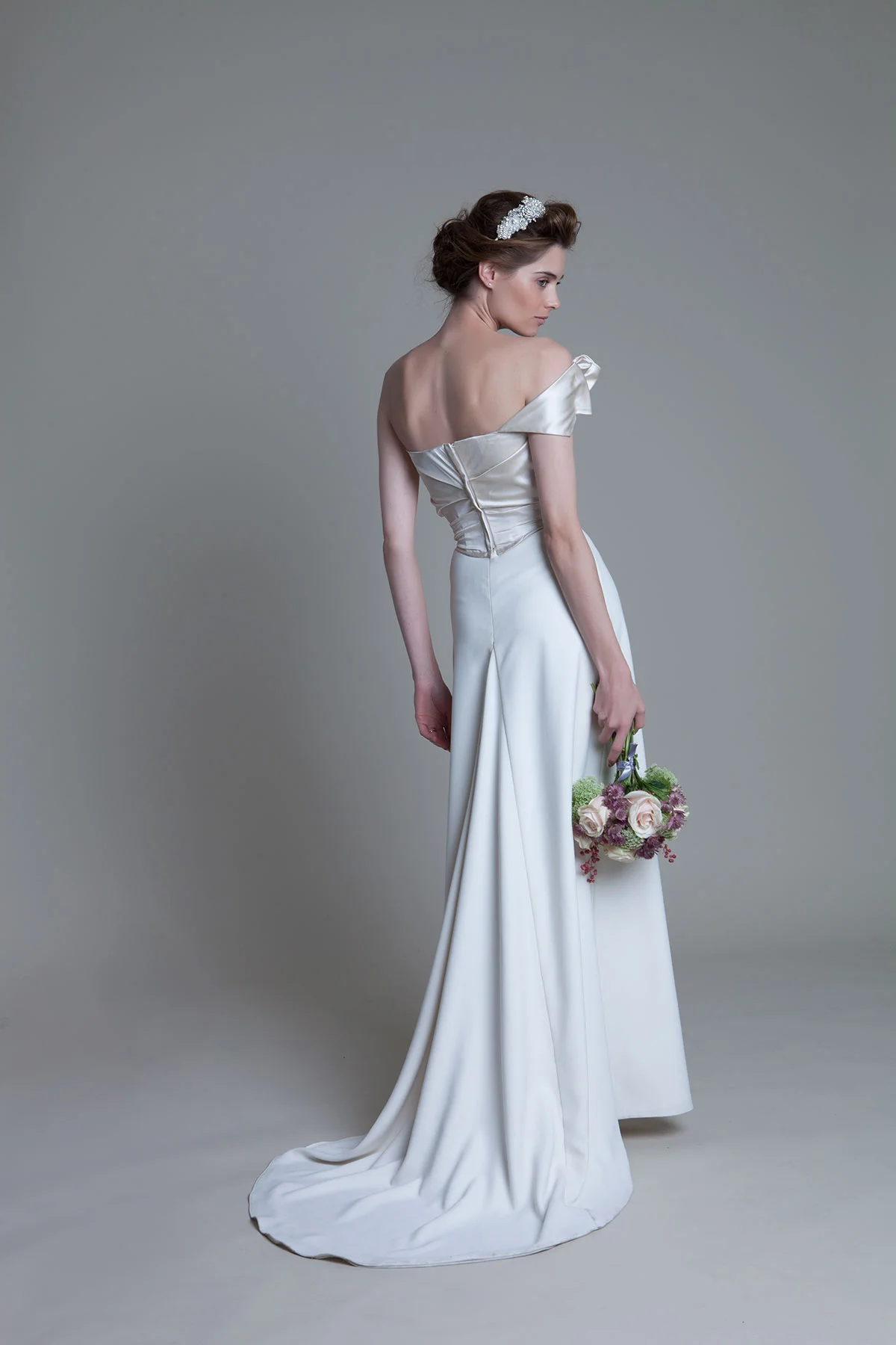 Back view of the Andrea Duchess Silk Corset Crepe Column Ivory Skirt with buddle train Bridal Wedding Dress by Halfpenny London