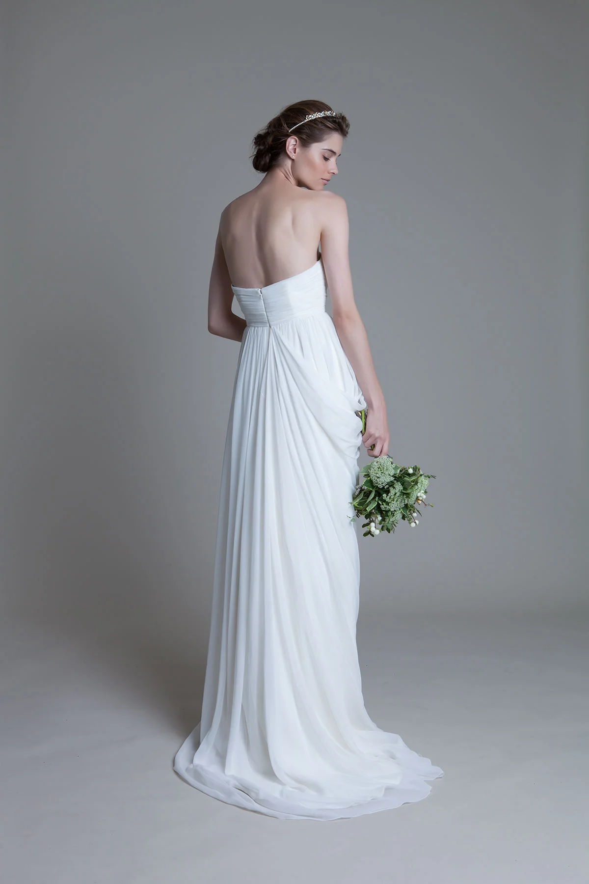 Back View of the Georgina soft pleated chiffon boned bodice with a draped grecian chiffon skirt with train bridal wedding dress by Halfpenny London