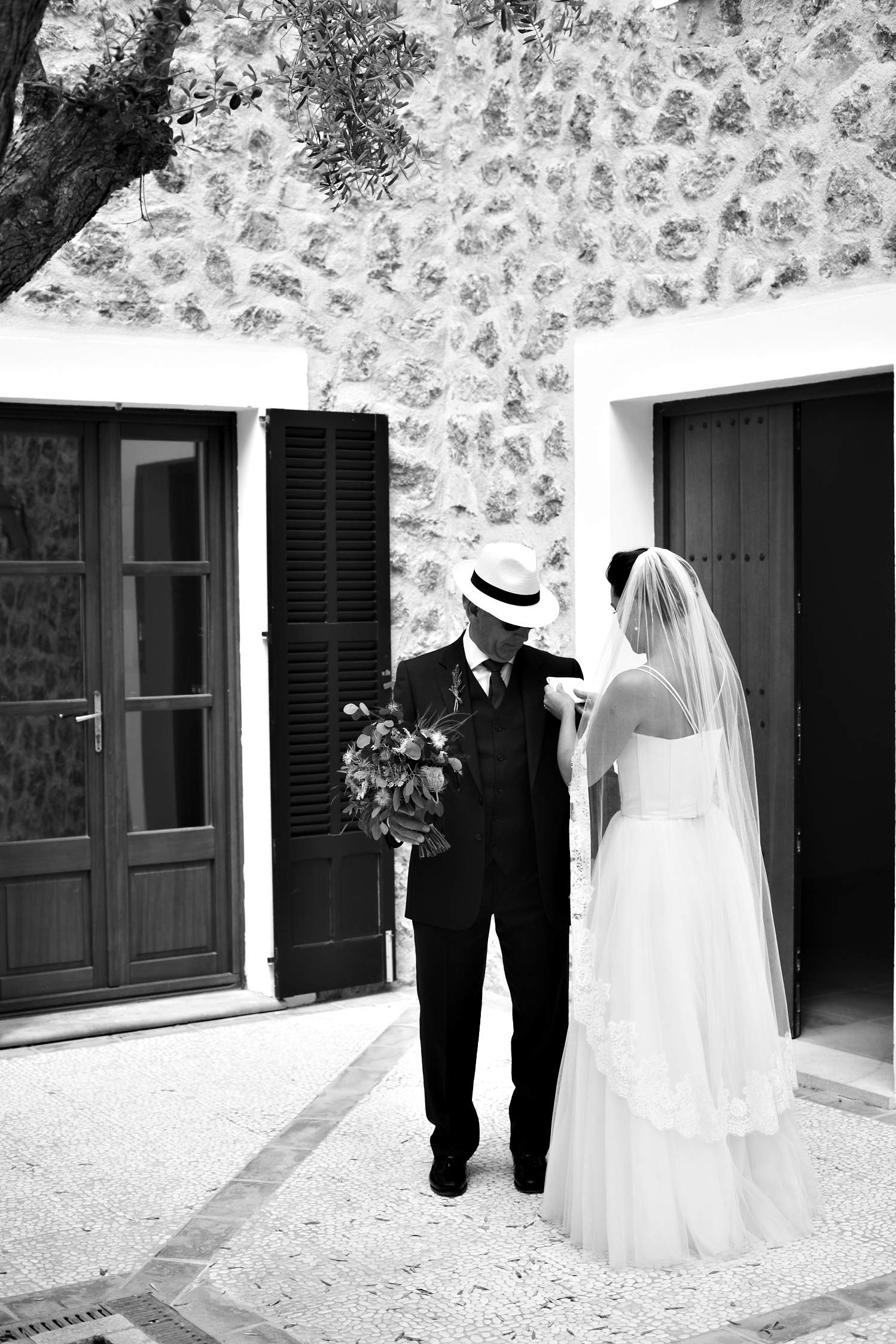 Real Halfpenny London bride Becky wears a bespoke corset in duchess silk with the Dita skirt and delicate silk tulle veil