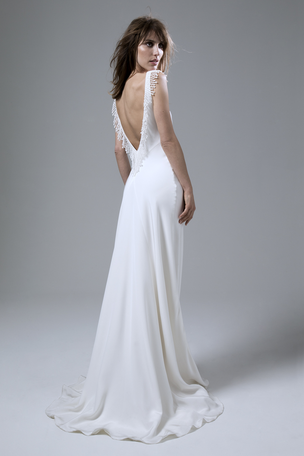 Silk crepe bias cut Vera wedding dress with French knot detail and plunging low back by Halfpenny London
