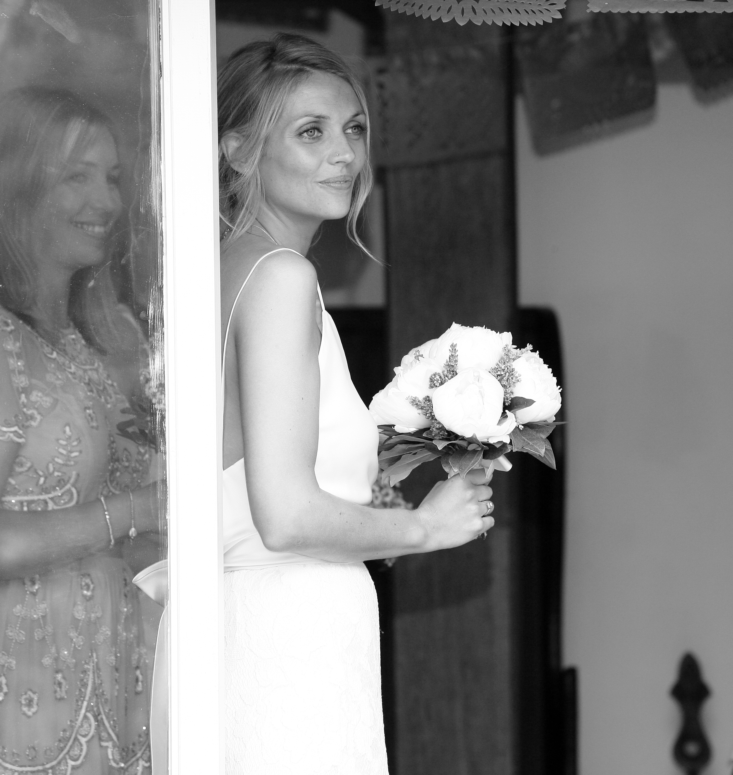 Beautiful bride Millie wears a wedding dress by Halfpenny London