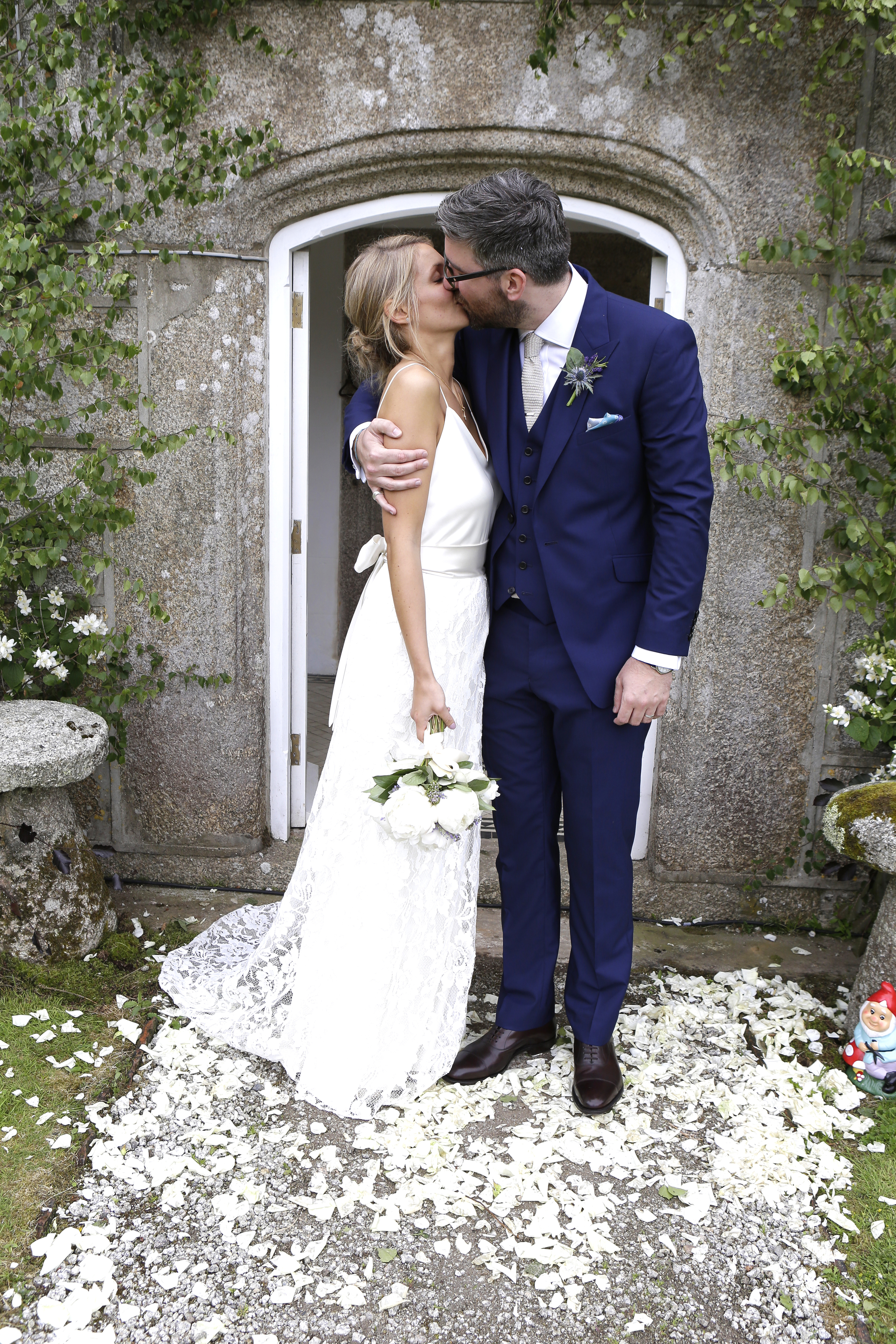 Beautiful bride Millie wears a wedding dress by Halfpenny London