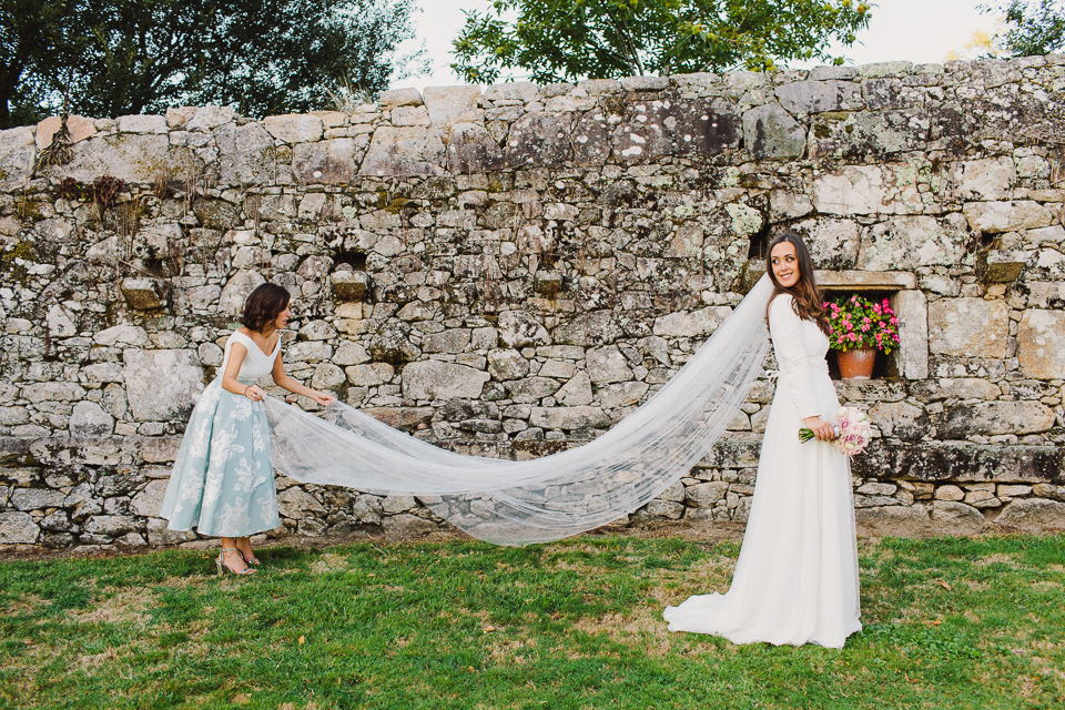 Gorgeous bride Andrea wore a bespoke wedding dress and veil by Halfpenny London