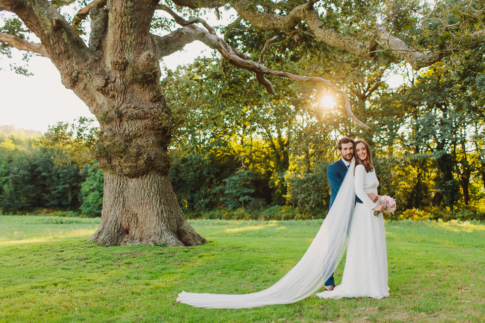 Beautiful bride Andrea wore a bespoke wedding dress and veil by Halfpenny London
