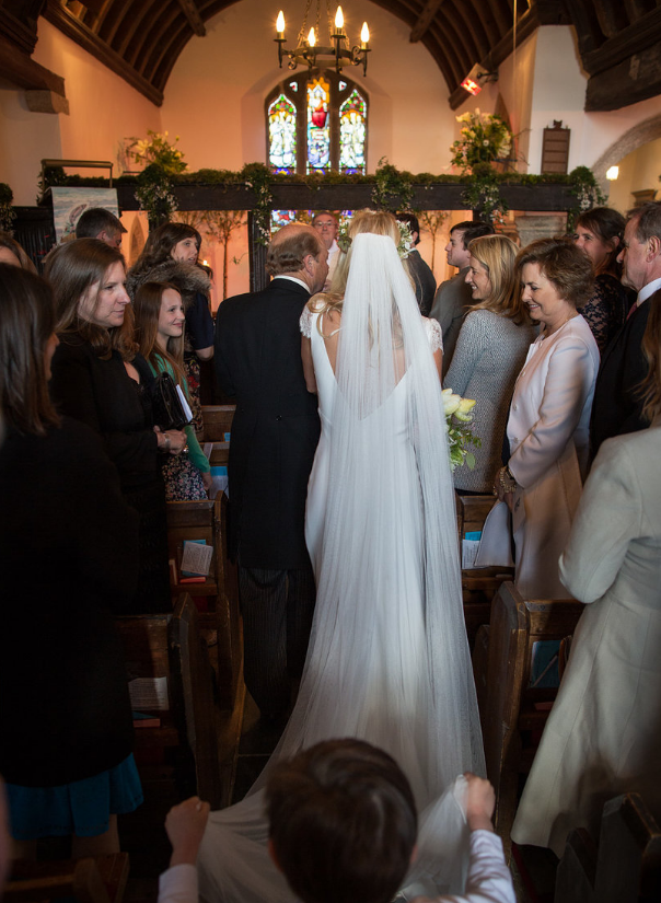 Carly wears a wedding dress by Halfpenny London