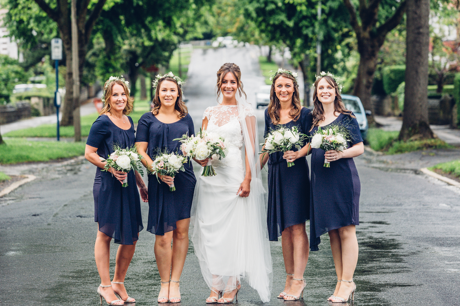 Gorgeous bride Jaye wears a lace, backless wedding dress by Halfpenny London