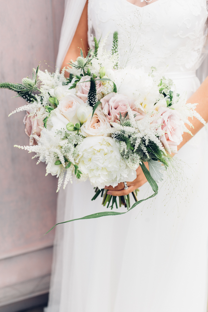 Gorgeous bride Jaye wears a lace, backless wedding dress by Halfpenny London