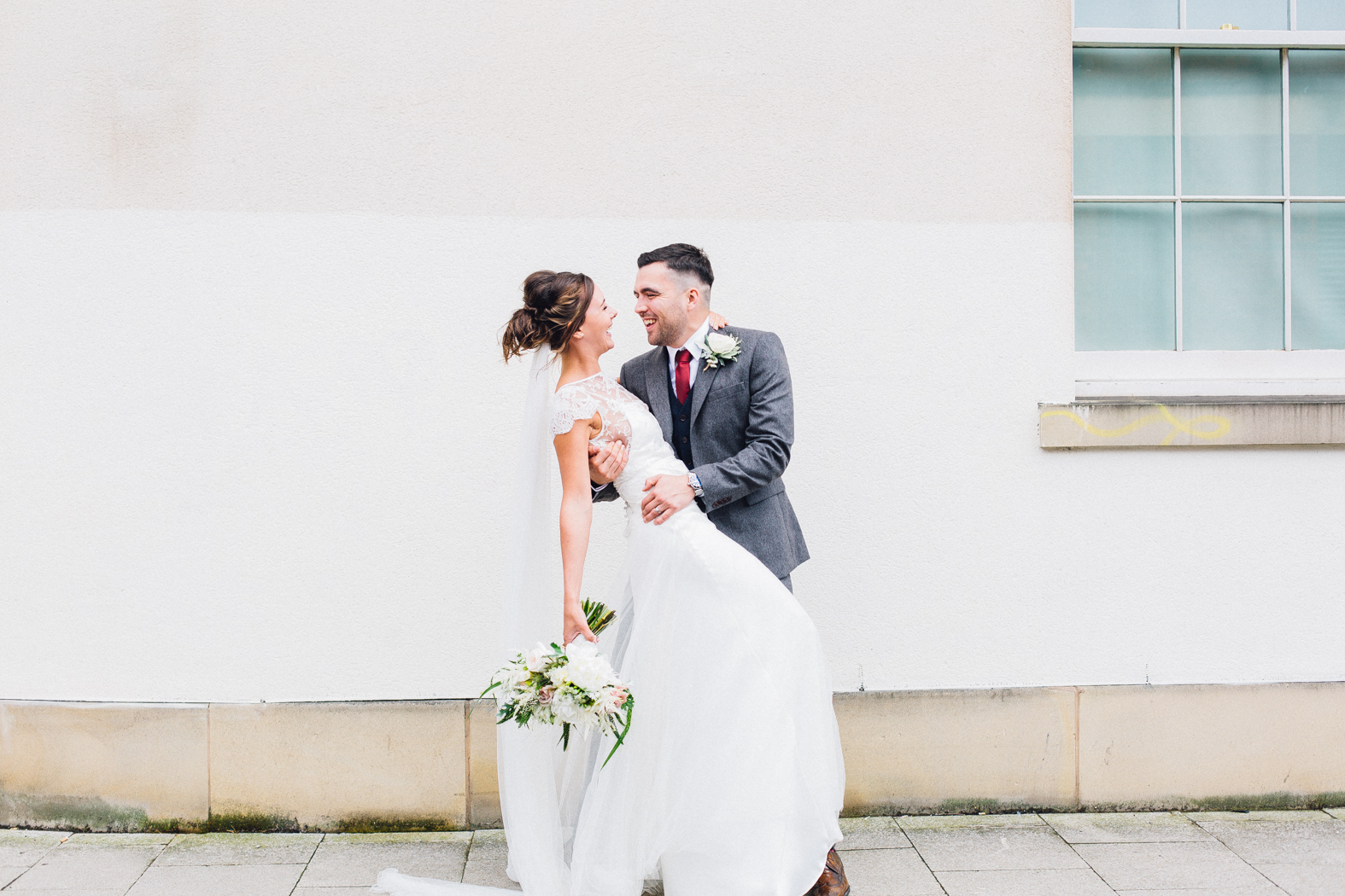 Gorgeous bride Jaye wears a lace, backless wedding dress by Halfpenny London