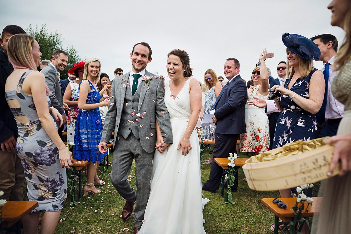 Beautiful bride Lucy wore a wedding dress by Halfpenny London