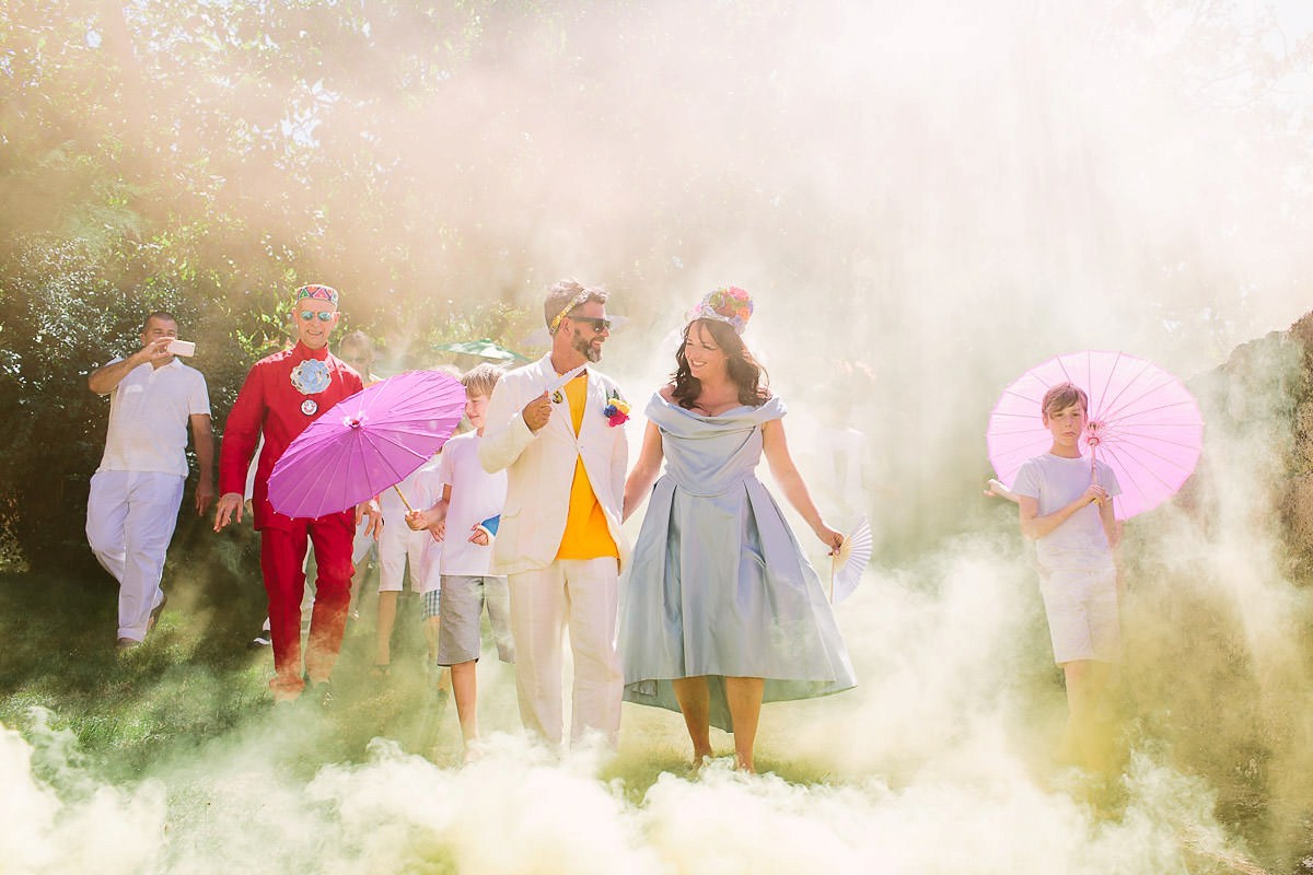Beautiful bride Jess wore a blue wedding dress by Halfpenny London in a stunning colourful ceremony