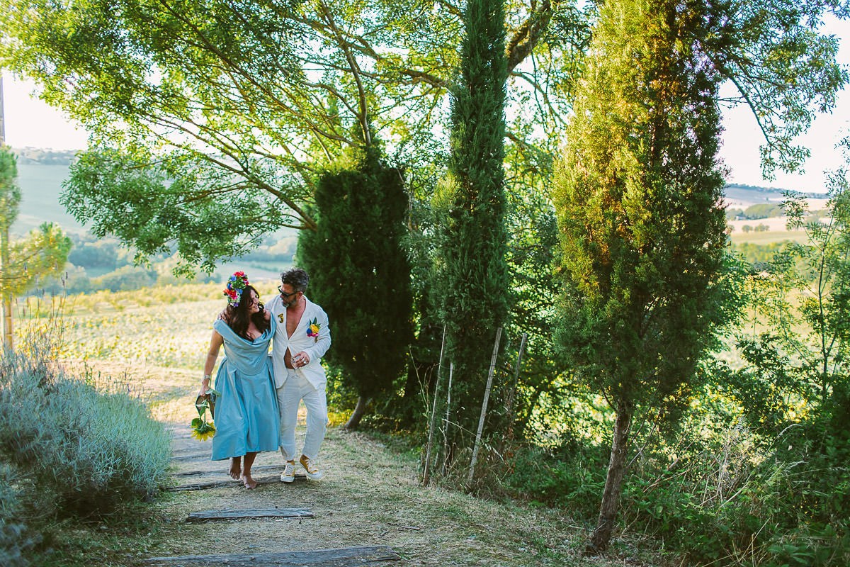 Beautiful bride Jess wore a blue wedding dress by Halfpenny London in a stunning colourful ceremony