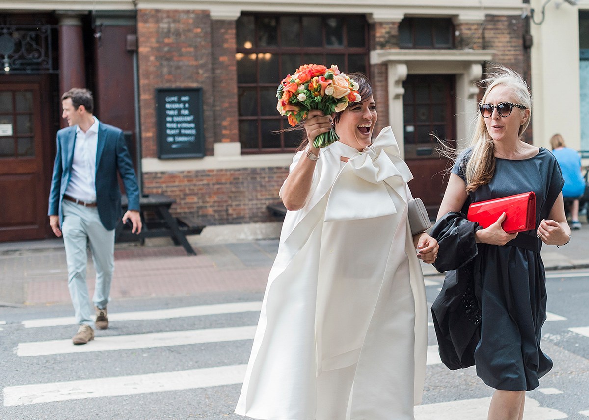Beautiful bride Jess wore the Halfpenny London Bow jacket for her laid back London wedding