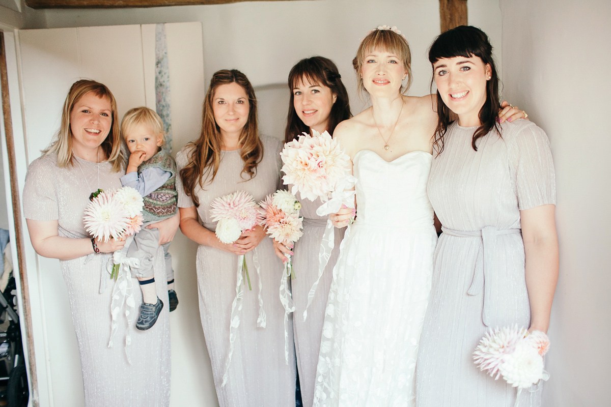 Beautiful bride Eleanor wears a wedding dress by Halfpenny London