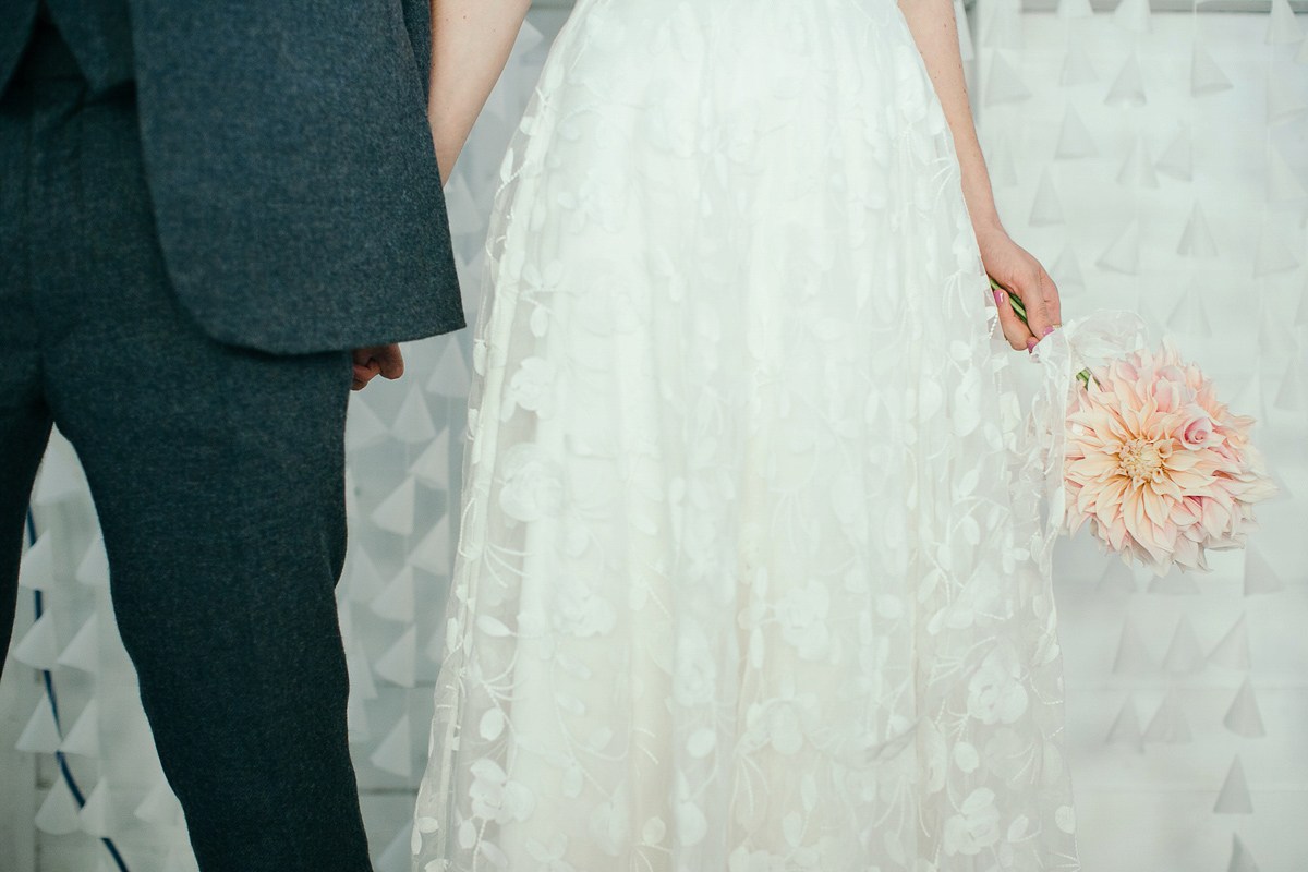 Beautiful bride Eleanor wears a wedding dress by Halfpenny London