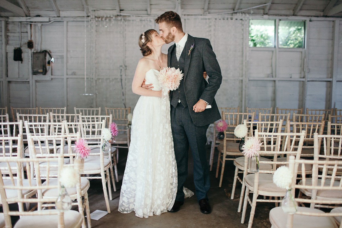 Beautiful bride Eleanor wears a wedding dress by Halfpenny London