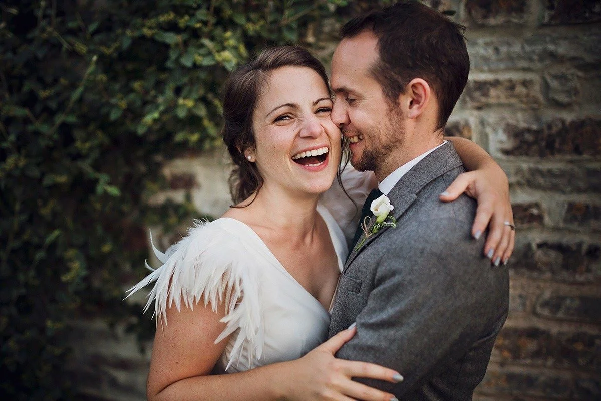 A beautiful bride wearing a Halfpenny London wedding dress