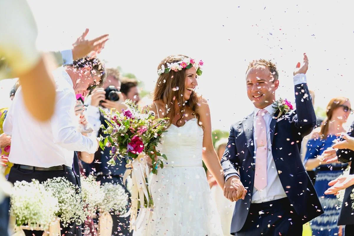 A beautiful bride wearing a Halfpenny London wedding dress