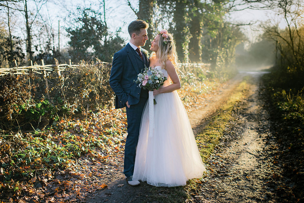 Beautiful bride Alice wore bridal separates by Halfpenny London | Stunning golden hour portraits for a winter wedding