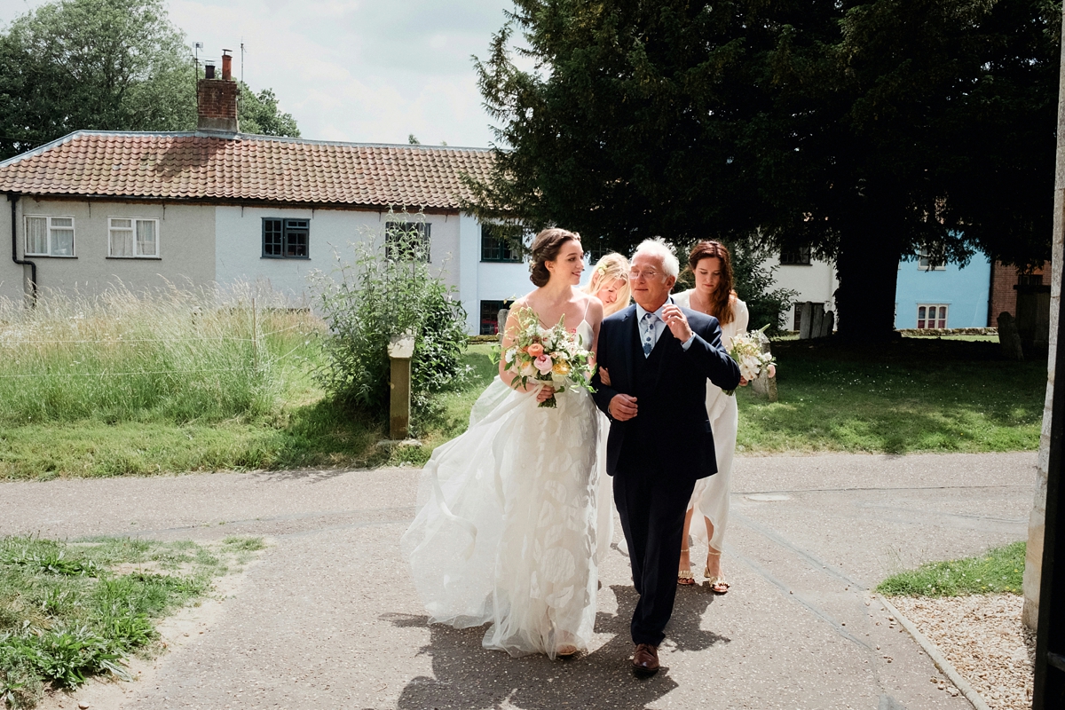 Beautiful bride Ashleigh wore a skirt and top by Halfpenny London on her wedding day