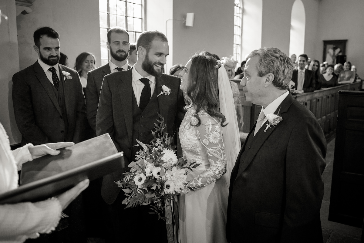 Beautiful bride Laura wore a wedding dress by Halfpenny London