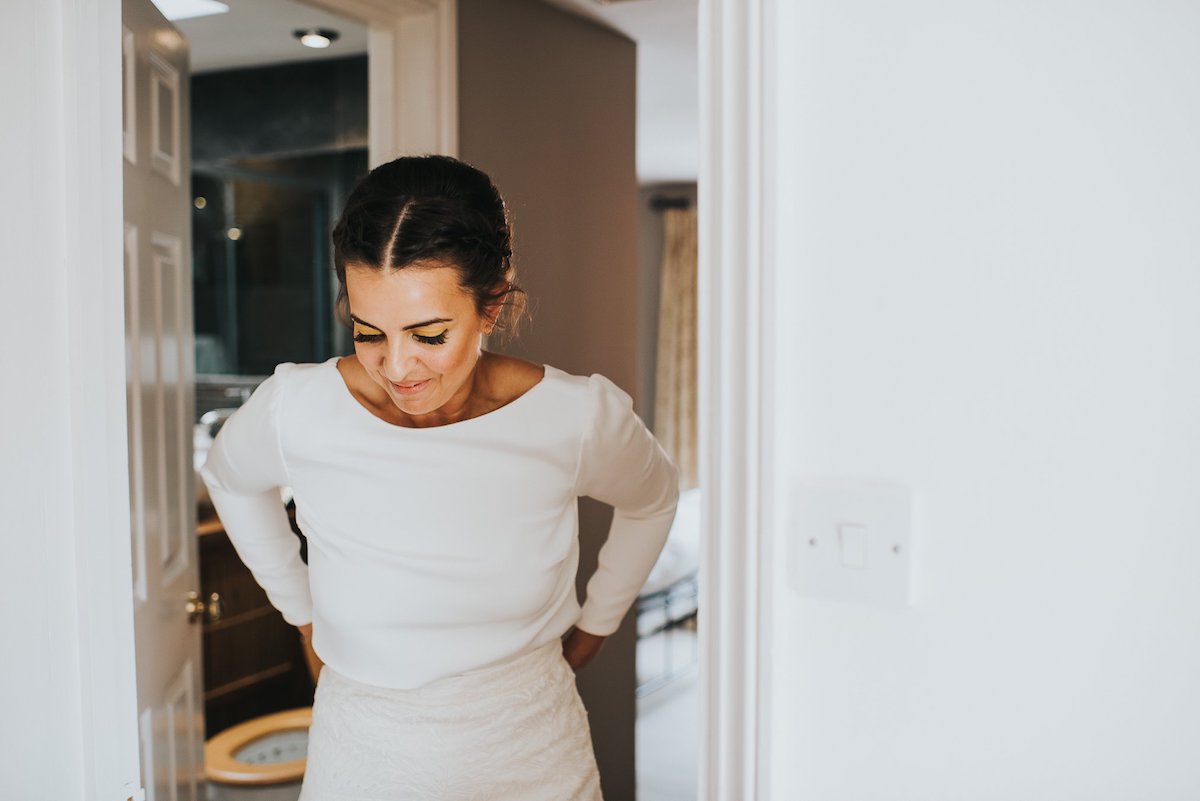 Beautiful bride Ashley wore a wedding dress by Halfpenny London