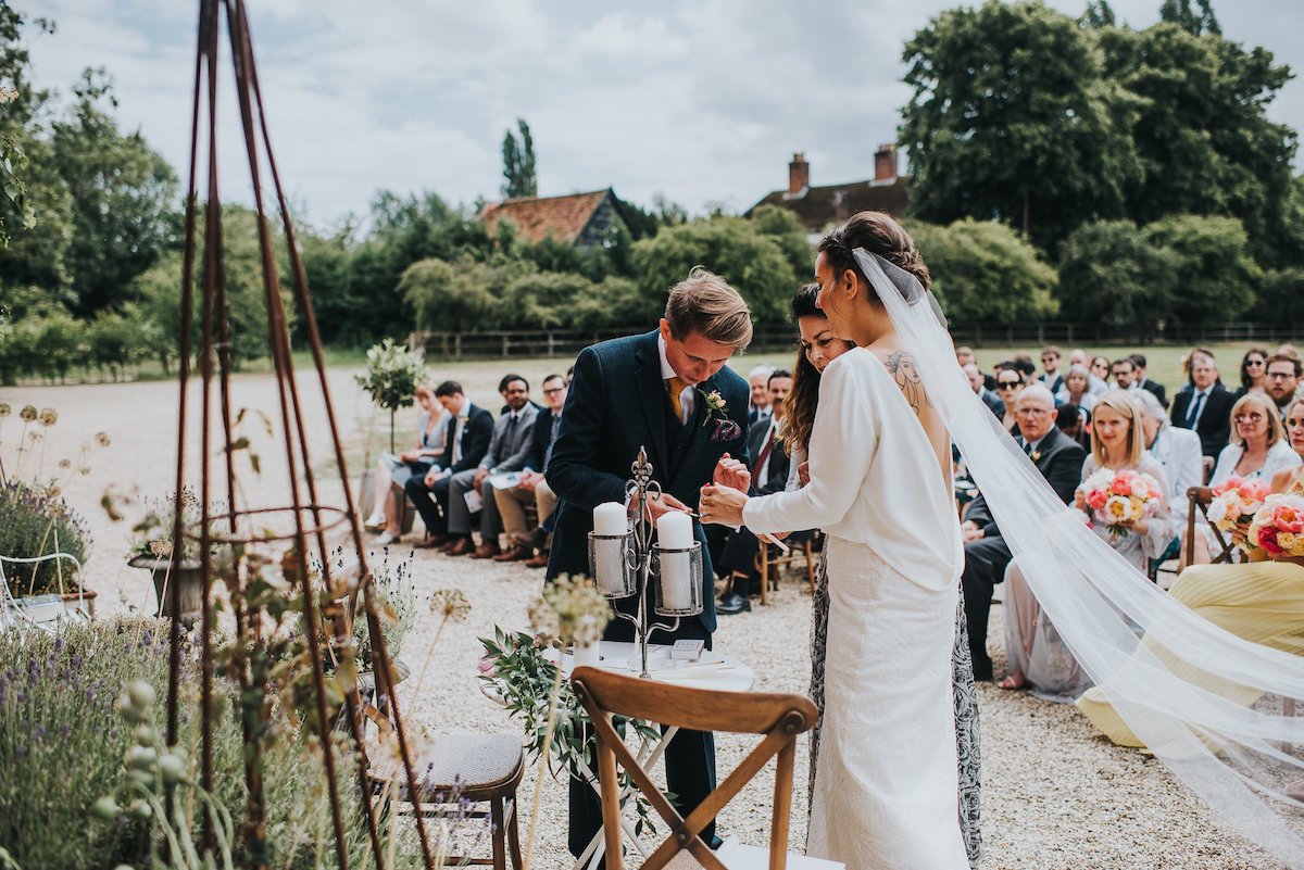 Beautiful bride Ashley wore a wedding dress by Halfpenny London