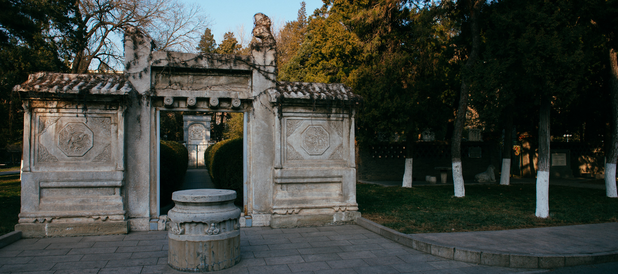 To the left, the three tombs of Matteo Ricci (1552-1610), Johann Adam Schall Von Bell (1591-1666), and Ferdinand Verbiest (1623-1688); to the right, other surviving tombs.