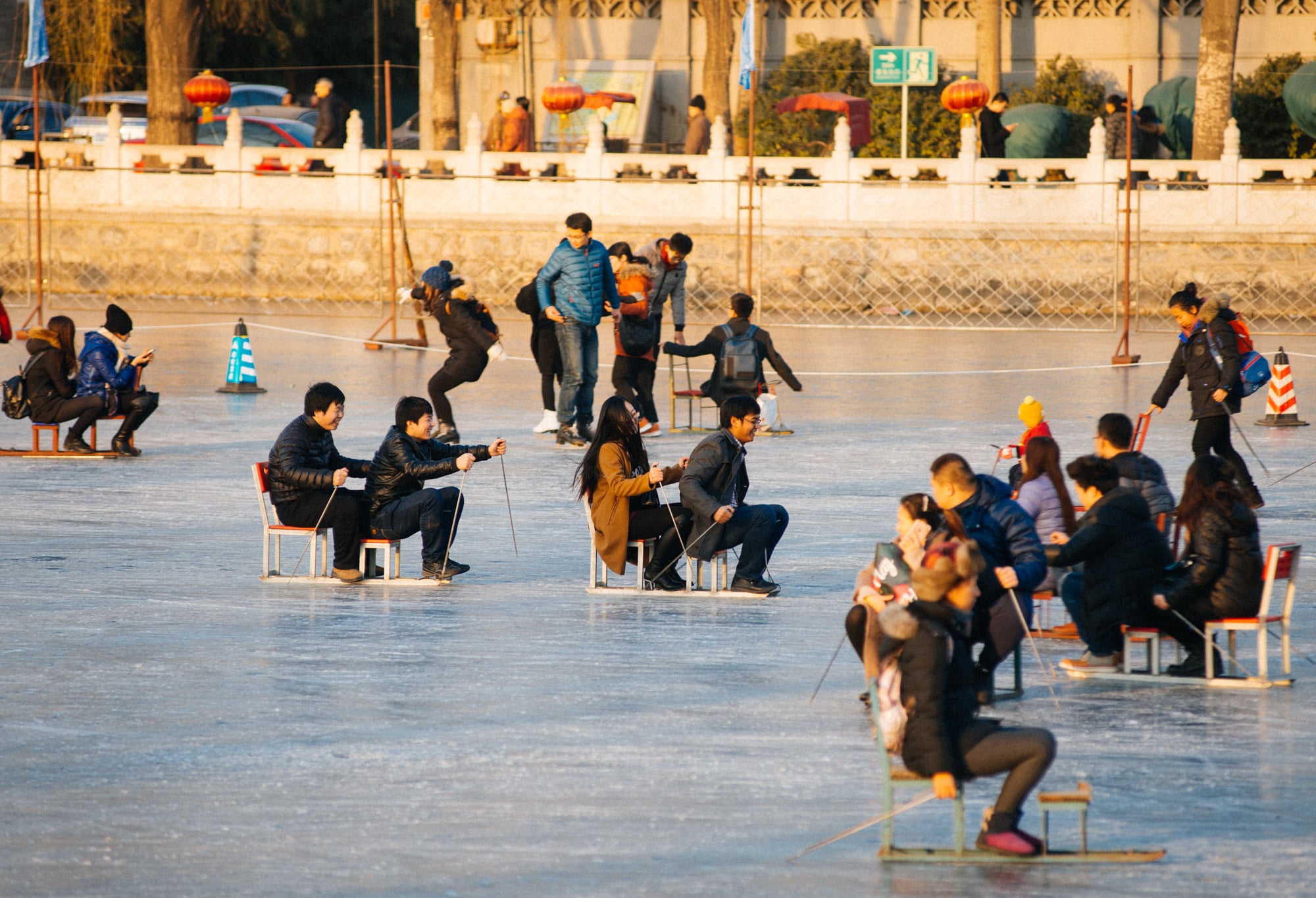 Tons of people would "line up" (I use quotes because standing in line is not something people actually do here in China. It was more like piling up in front of the ticket window) to skate and play in the ice.