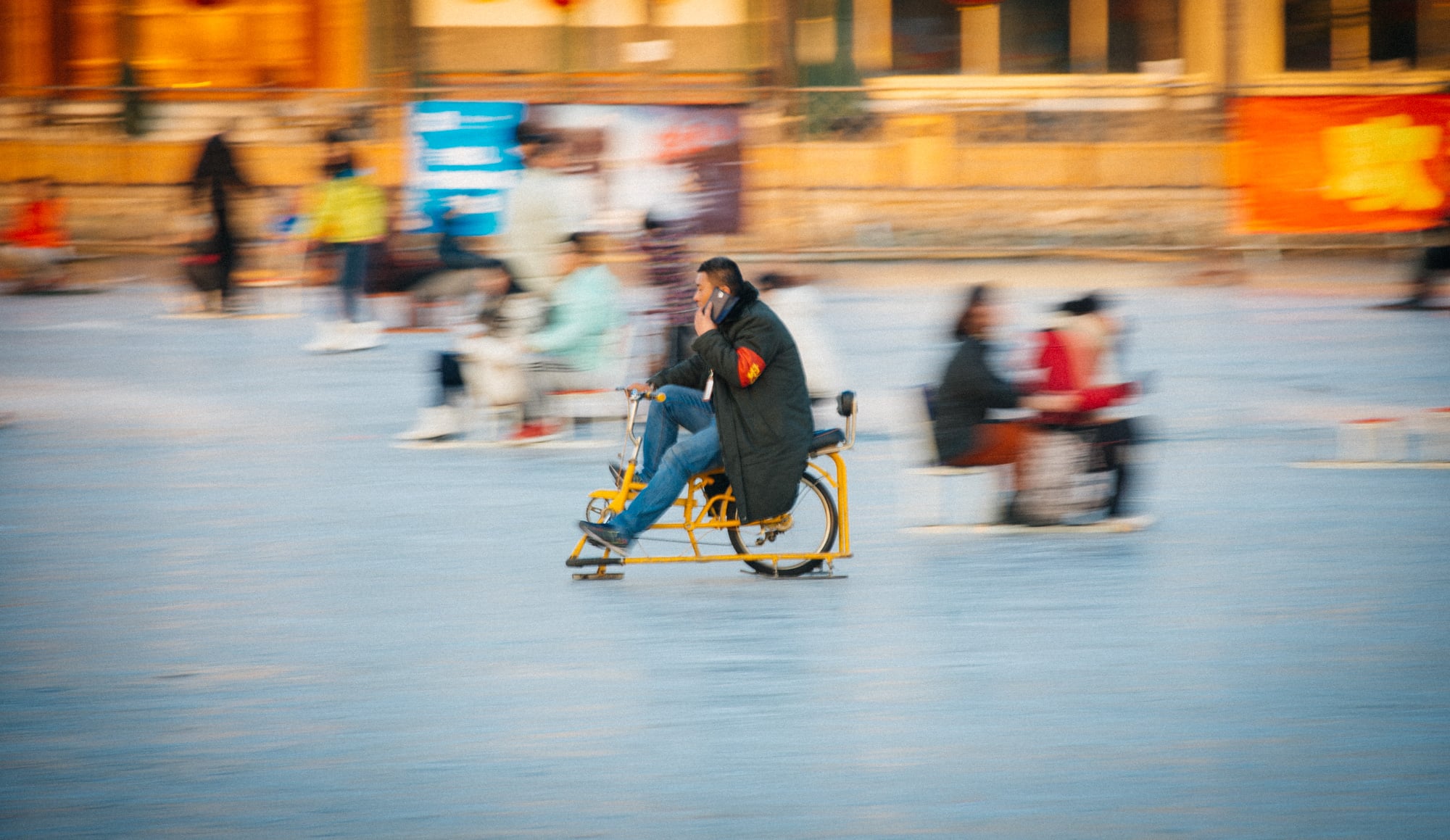 This guy speeds past with this bicecle (get it? b-ICE-cle... ok, maybe not that funny) talking on the phone.
