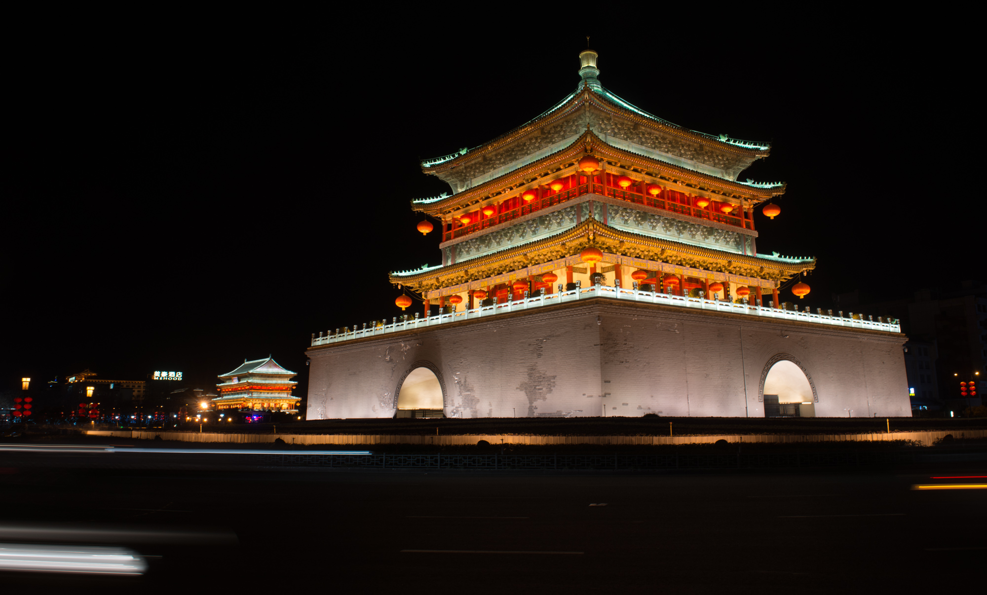 At night the Drum (in the back, on the left) and Bell towers light up. Surrounded by shopping malls and restaurants, the area is very popular amongst tourists.