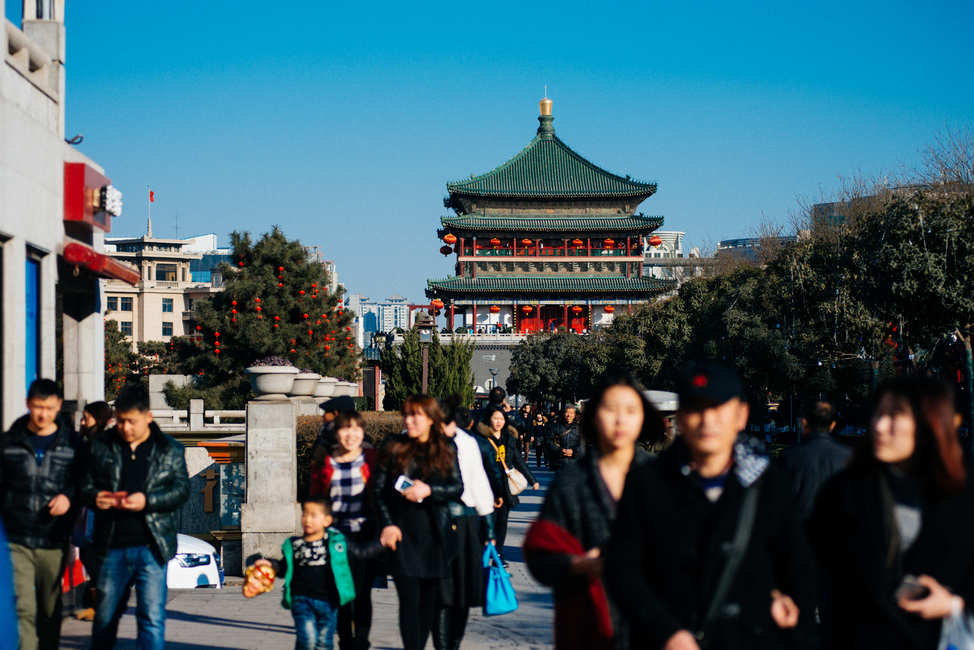 At the bottom of the Drum Tower there is a MacDonald's (seriously, it's right there on the left of this pic). When you get to the MacDonald's, look left and you'll see this: the Bell Tower.