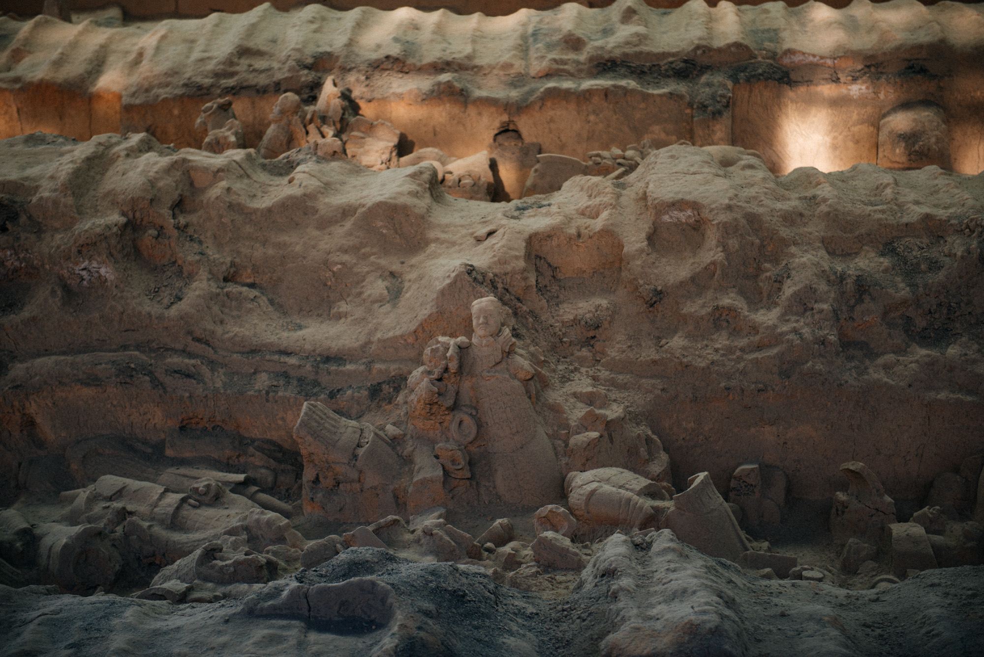 Further back in the pit, several statues still lay waiting to be excavated and restored. Actually, I think it's really cool the way it is. Once they are finished putting all the statues together some of the magic might be gone.