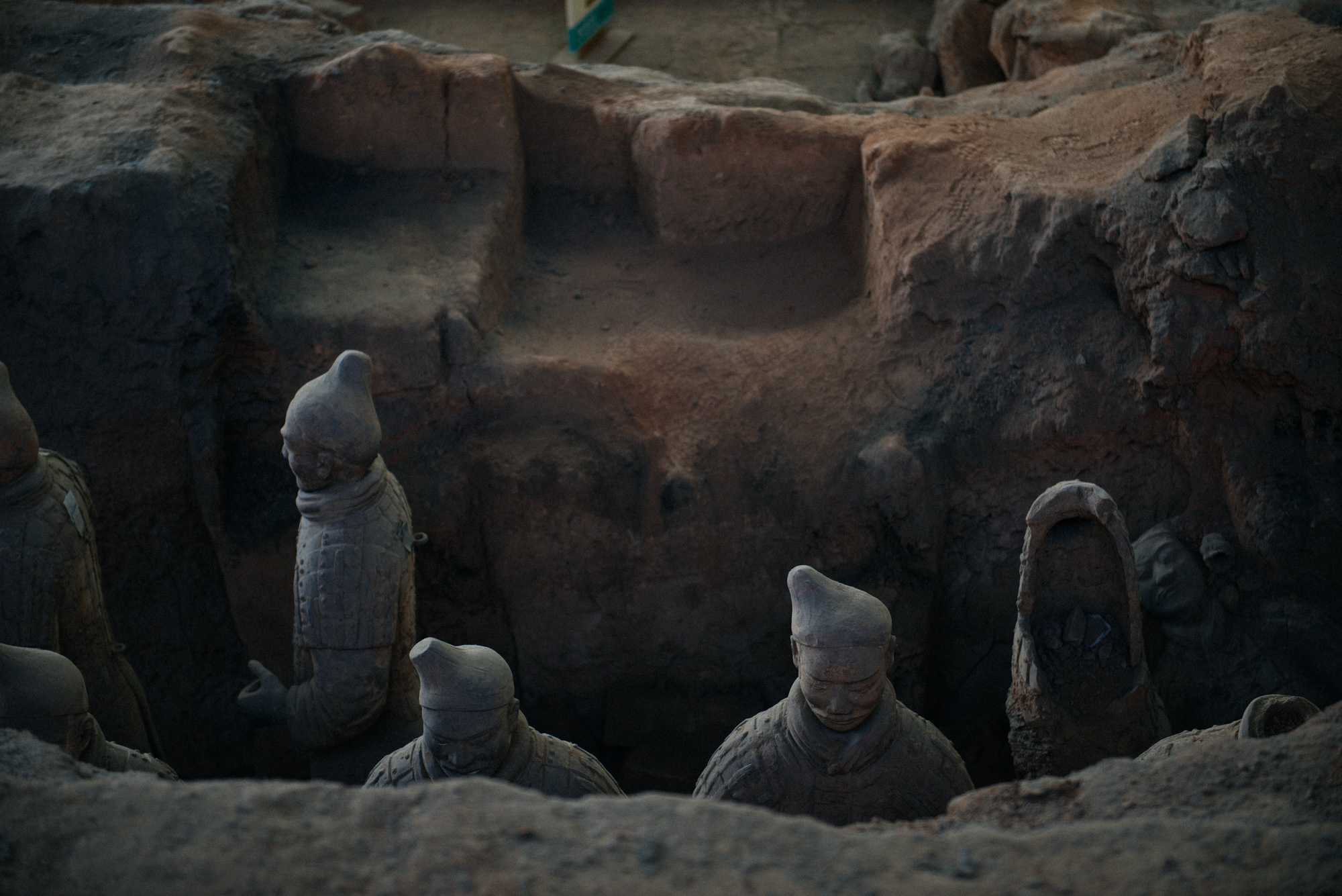 The statues were displayed in corridors and facing several ways. They were also all in full color originally, but that has faded away as well. 