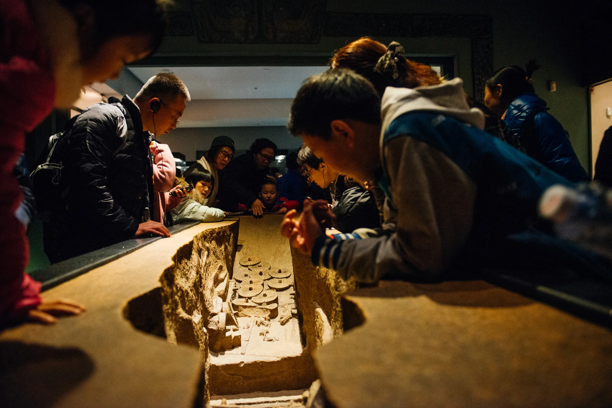The place was packed. It was hard to even see the exhibits. Here, kids and adults pile themselves on a replica of a tomb.