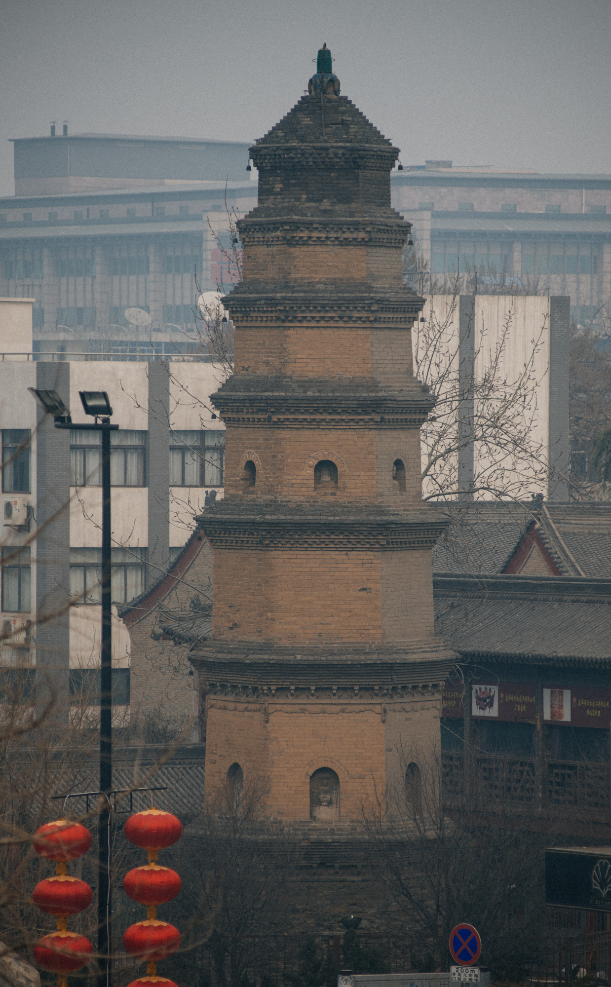 You can see a little Buddha in the "window" of the pagoda.