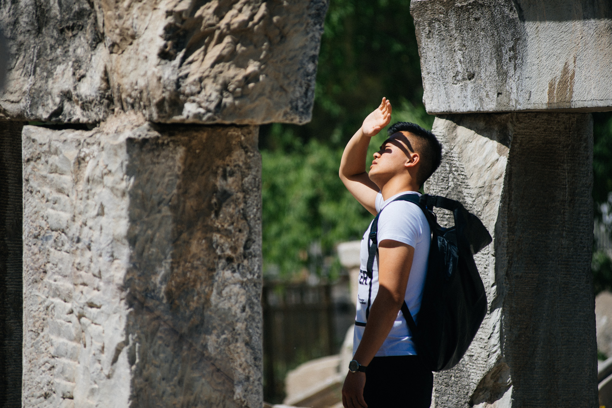 On a hot spring day last week, a tourist looks at ruins that have been stacked up in a seemingly random fashion. It's like a modern day Stonehenge. 
