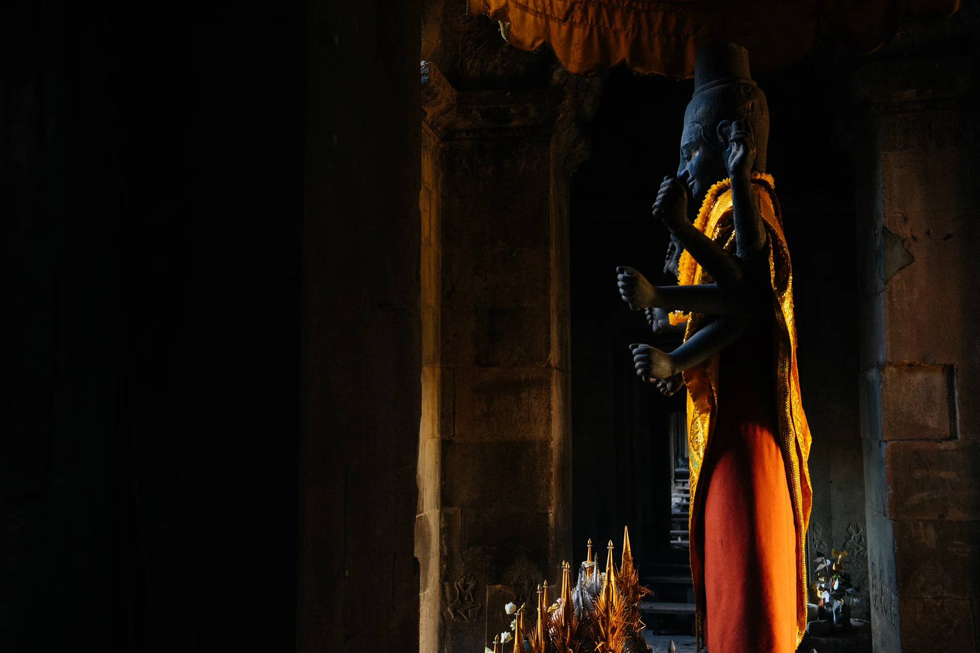 A statue of Vishnu, the God with 4 pairs of arms is now in the southwest corner of the temple, but it is believed that this statue may have been originally placed in the very center of Angkor Wat, at the top.