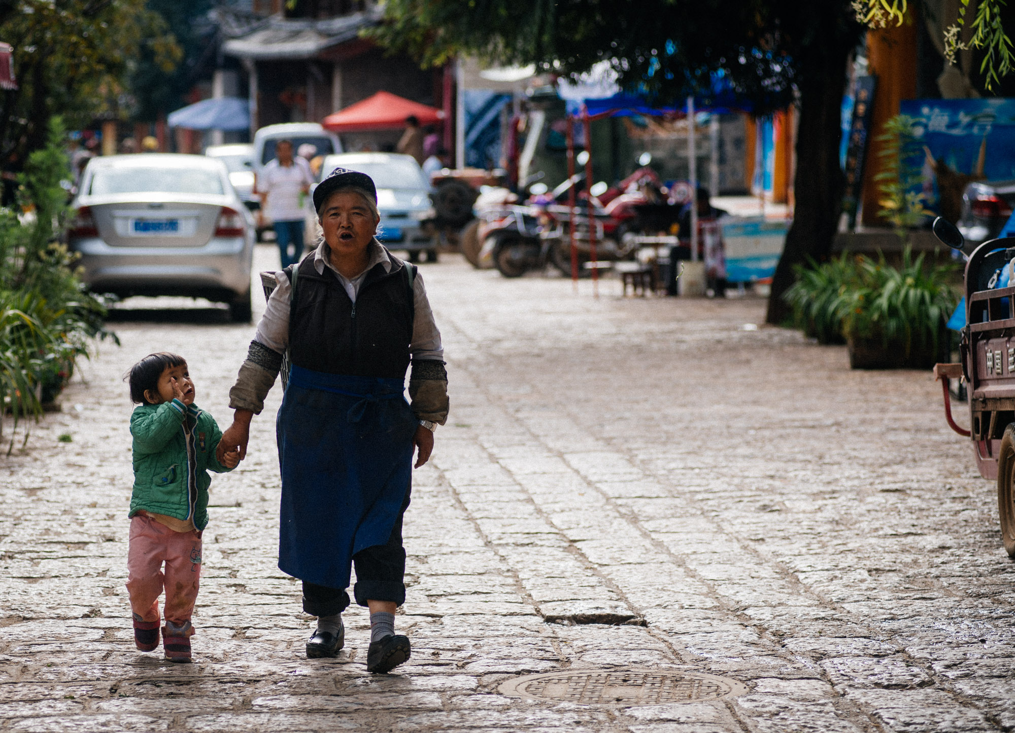  As most places in China, grandmothers take care of children while the parents go to bigger cities for better jobs and send money home. 