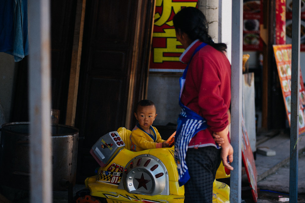  Despite being ancient and traditional, electronic rides have arrived in this small town. 