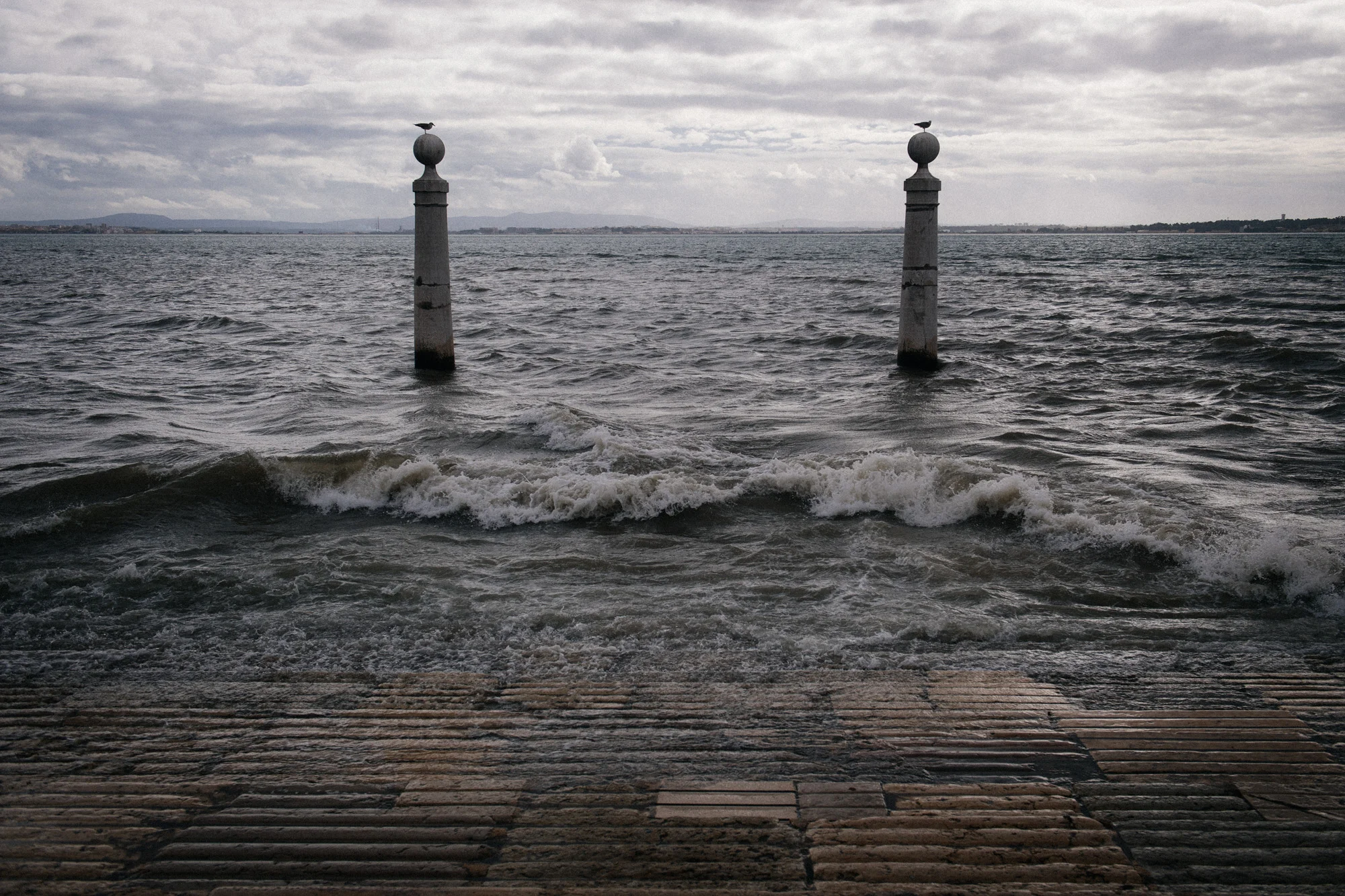 On the other end of the square is the rio Tejo. In 1755 during the earthquake hundreds of people fled to the open space of the square and watched as the river receded and returned in full force and huge waves of a tsunami.