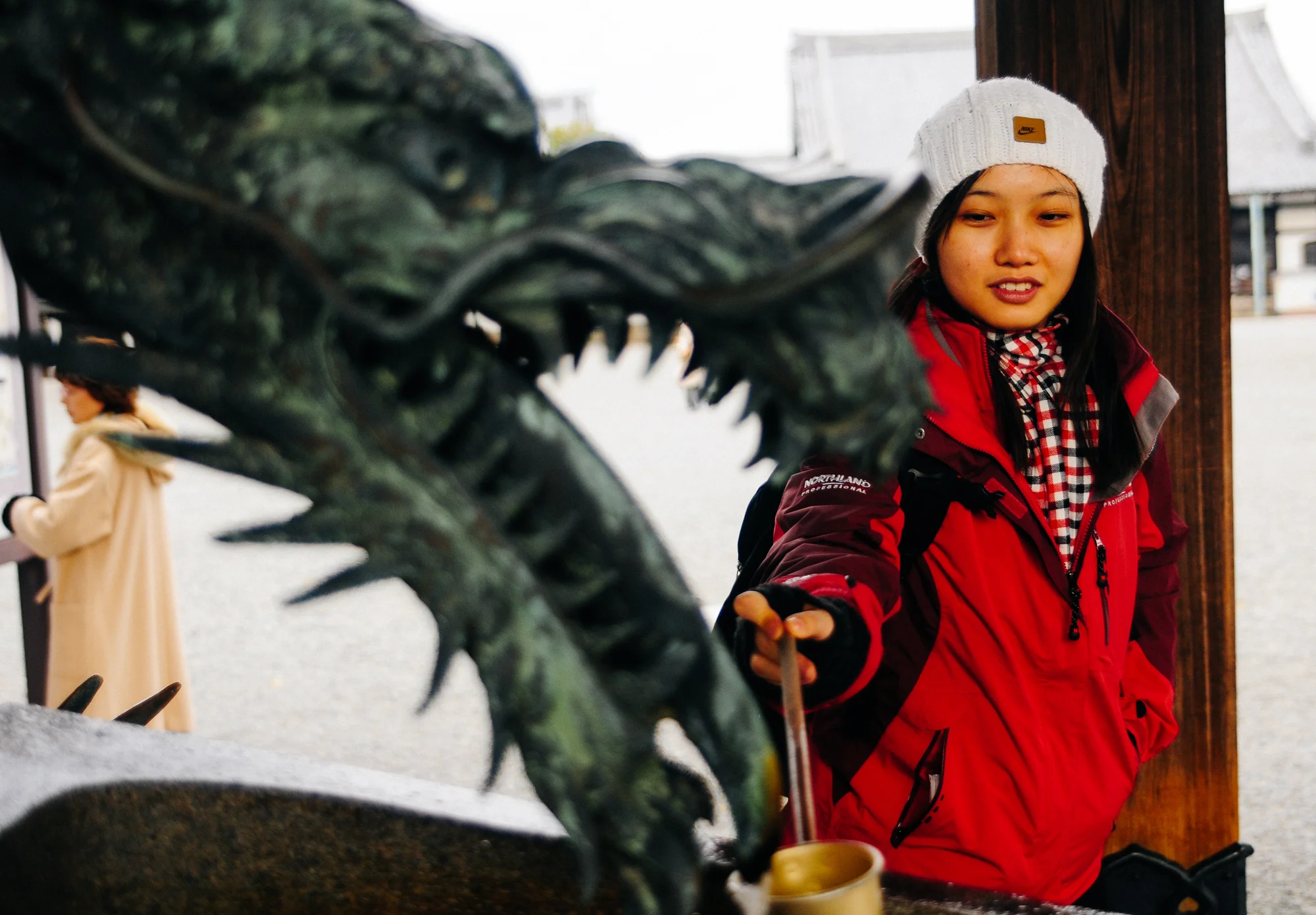 The water in dragon fountains inside temples is said to bring good fortune. Tradition says you should take some water with a ladle and pour it indo your hands and maybe splash some on your face or even have a sip and it will bring you good luck.