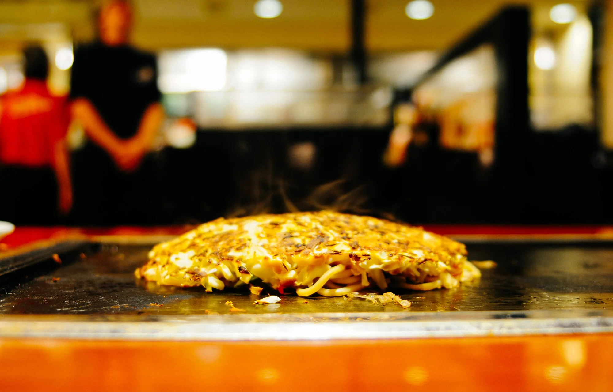 The okonomiyaki is sometimes called the Japanese pizza or crepe. I tell you it tastes nothing like a pizza or crepe.