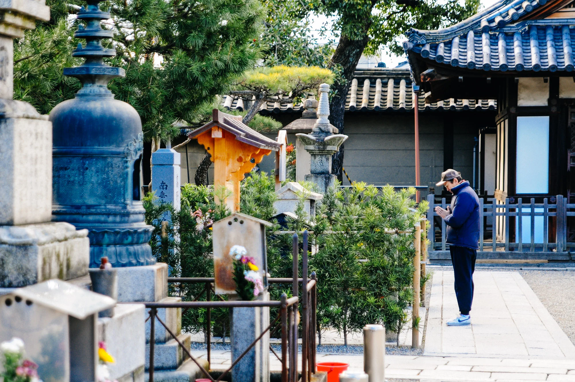 The temple also has a cemetery, where people go to pay their respects and pray.
