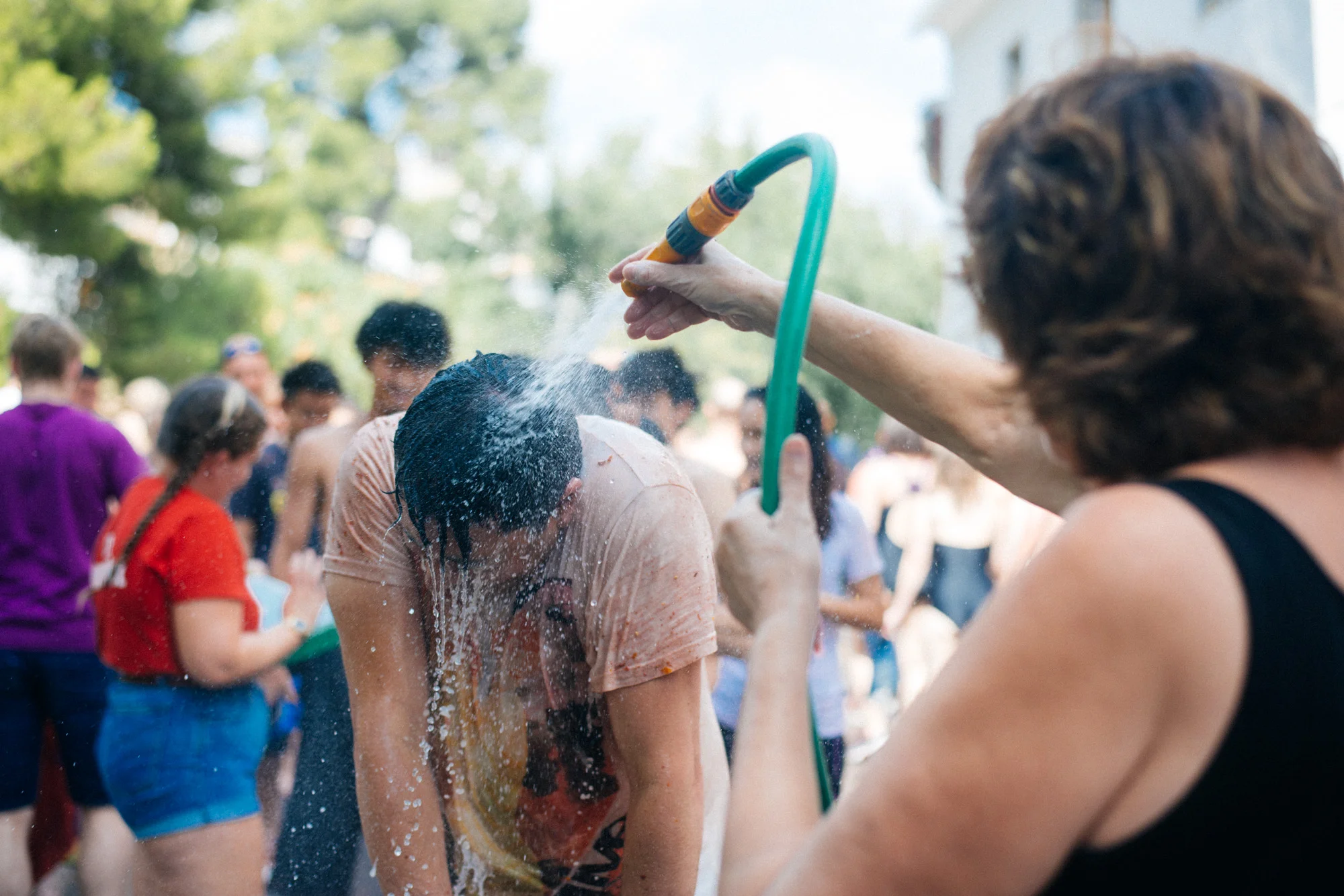 For two euros you can get hosed down with freezing cold water. This lady even threw in some shampoo for free.