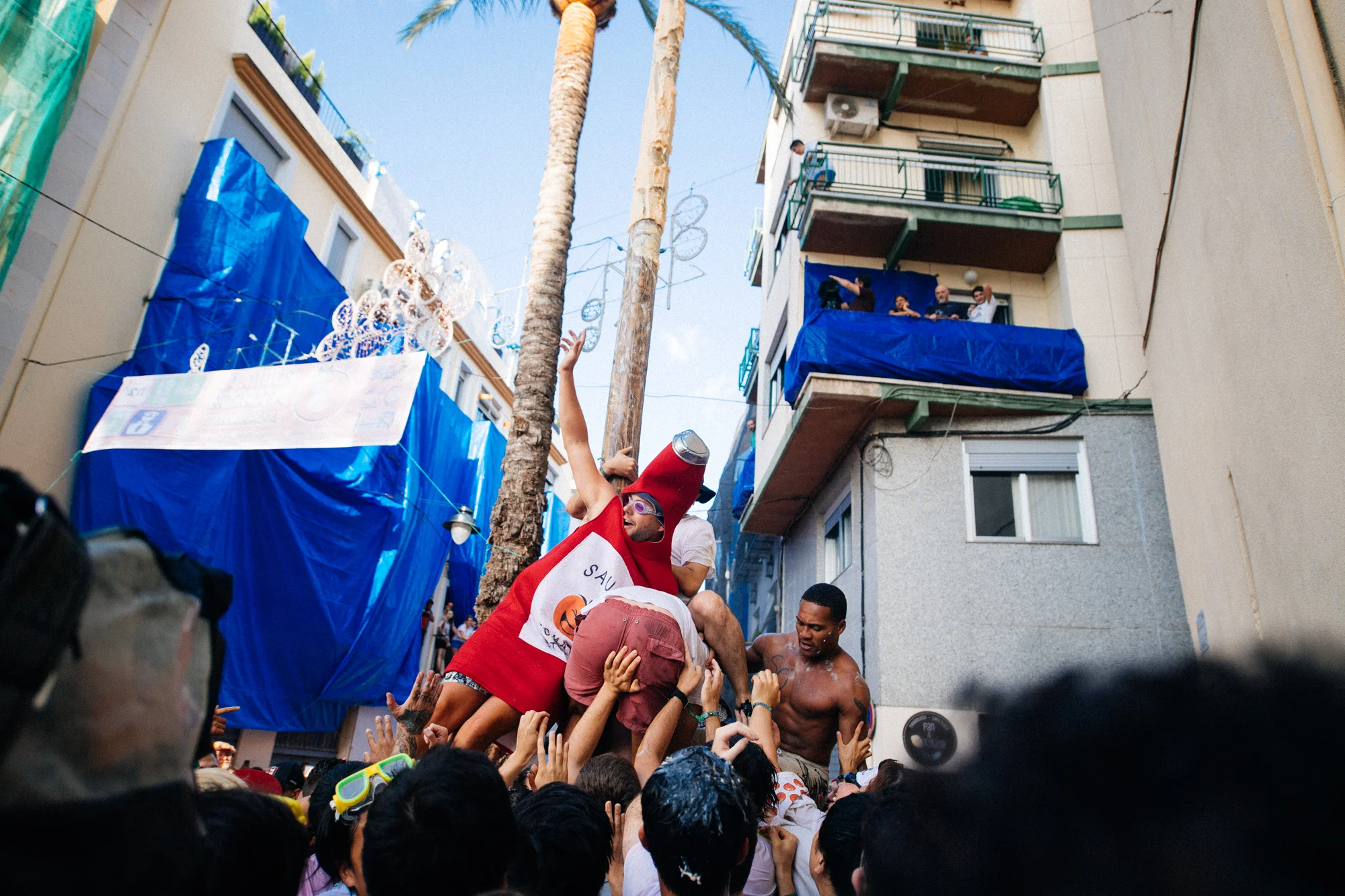 Tomato zombies attempt to climb the pole while Ketchup-man gets a selfie and brings everyone back down.